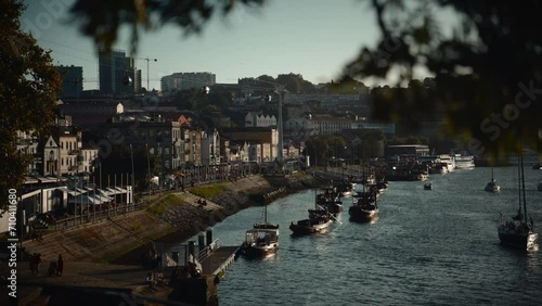 Vila Nova de Gaia ribeira, promenade by the Douro River with rabelo boats in Porto photo