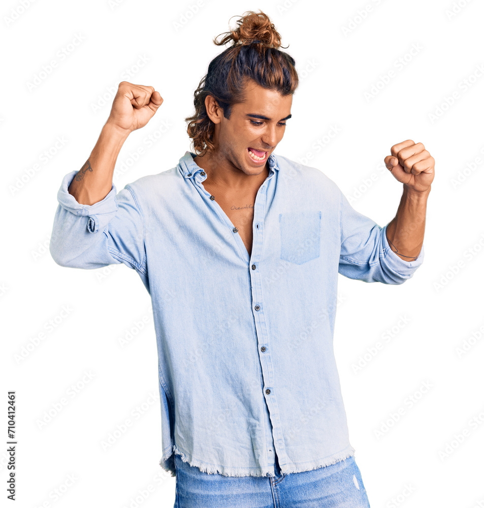 Young hispanic man wearing summer style dancing happy and cheerful, smiling moving casual and confident listening to music