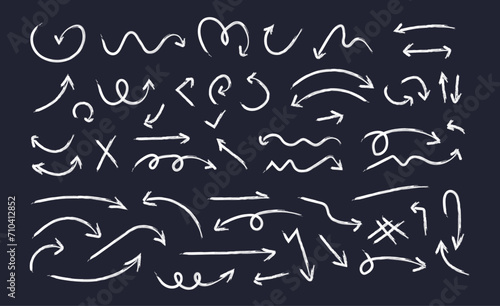 Charcoal arrows and hand drawn curved arrows, freehand different lines, doodle style marker drawing, black chalk lines, direction pointer on black background vector illustration.