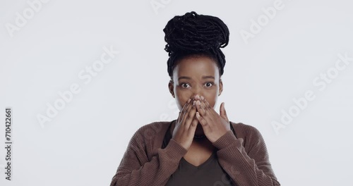 Wow, surprise and drama with reaction of black woman to news in studio on white background. Portrait, alarm and gossip with gasp emoji of young person shocked by omg information or announcement