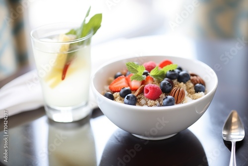 breakfast quinoa with berries and almond slivers photo