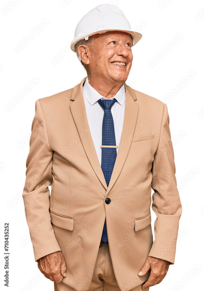 Senior caucasian man wearing architect hardhat looking away to side with smile on face, natural expression. laughing confident. Senior caucasian man wearing architect hardhat looking away to side with smile on face, natural expression. laughing confident.