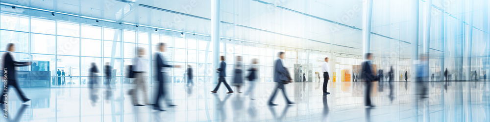 blurred vip business people walking at a trade fair, conference or walking in a modern hall. blurred vip business people walking at a trade fair, conference or walking in a modern hall.