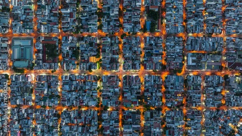 Drone view timelapse traffic moving on chessboard order area of city - Nha Trang city, Khanh Hoa province, central Vietnam photo