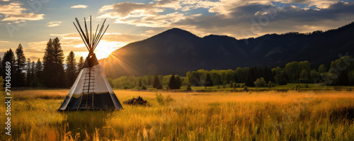 tipi american indiana tent in sunny evening backglight.