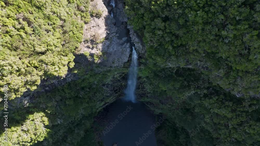Hidden waterfall in Madeira forest, drone reveal shot from above Hidden waterfall in Madeira forest, drone reveal shot from above