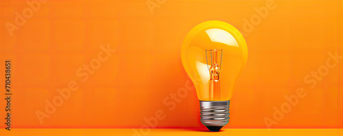 Orange background with bulb of idea concept.