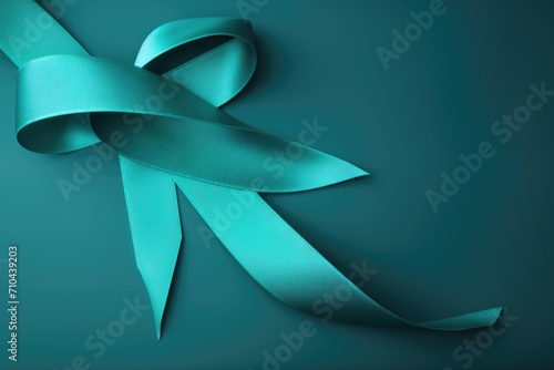 Teal awareness ribbon, Obsessive Compulsive Disorder (OCD), Polycystic Ovary Syndrome (PCOS) disease, Post Traumatic Stress Disorder (PTSD). Healthcare and medical concept. photo