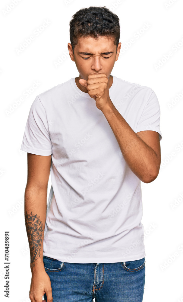 Fototapeta premium Young handsome african american man wearing casual white tshirt feeling unwell and coughing as symptom for cold or bronchitis. health care concept.