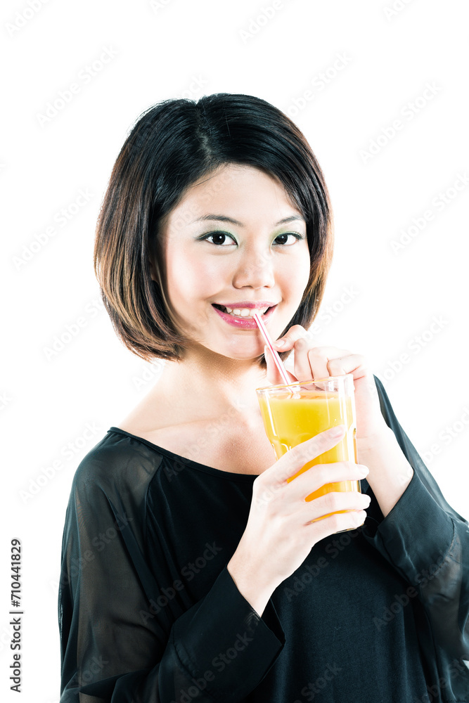 beautiful Chinese woman drinking orange juice. beautiful Chinese woman drinking orange juice.