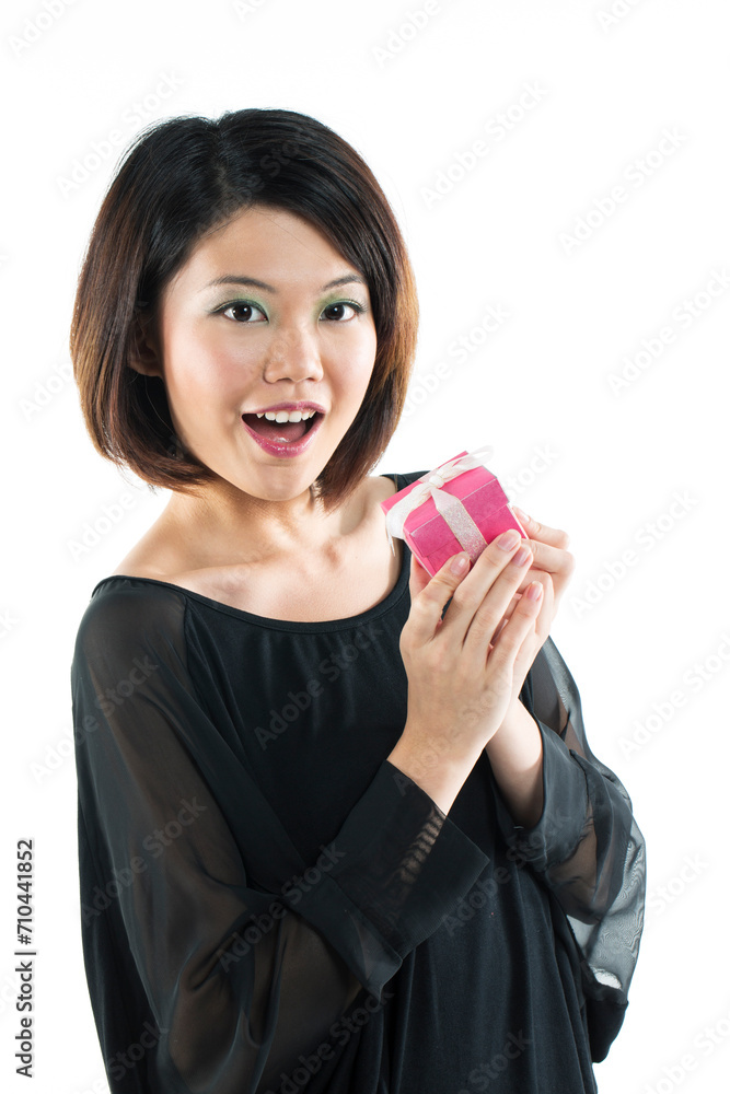 Happy Asian woman receiving a gift Happy Asian woman receiving a gift
