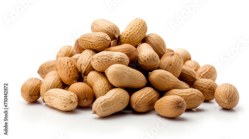 A pile of peanuts on a white surface