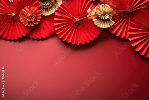 Chinese New Year background with red paper fans and flowers with copy space. Asia traditional decoration.