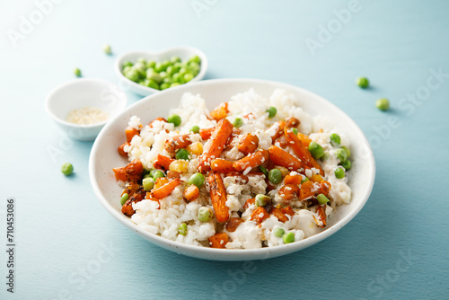 Rice bowl with carrot and pea