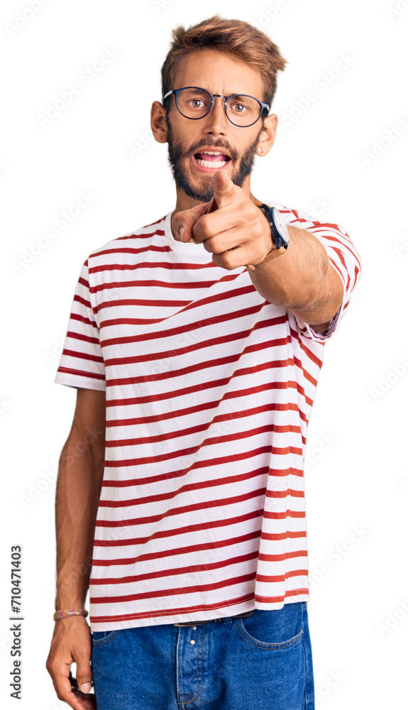 Handsome blond man with beard wearing casual clothes and glasses pointing displeased and frustrated to the camera, angry and furious with you Handsome blond man with beard wearing casual clothes and glasses pointing displeased and frustrated to the camera, angry and furious with you