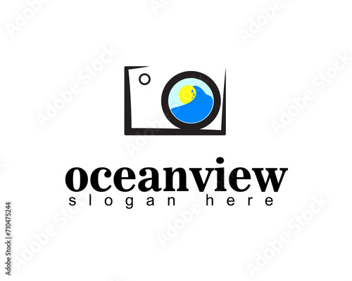 
camera with an ocean image lens logo design templte photo