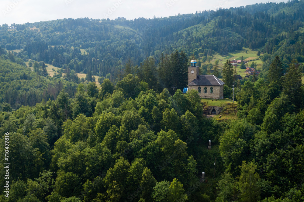 Aerial view of the Church of the Virgin Mary of Seven Grievances in top of hill at Oscadnica, Slovakia