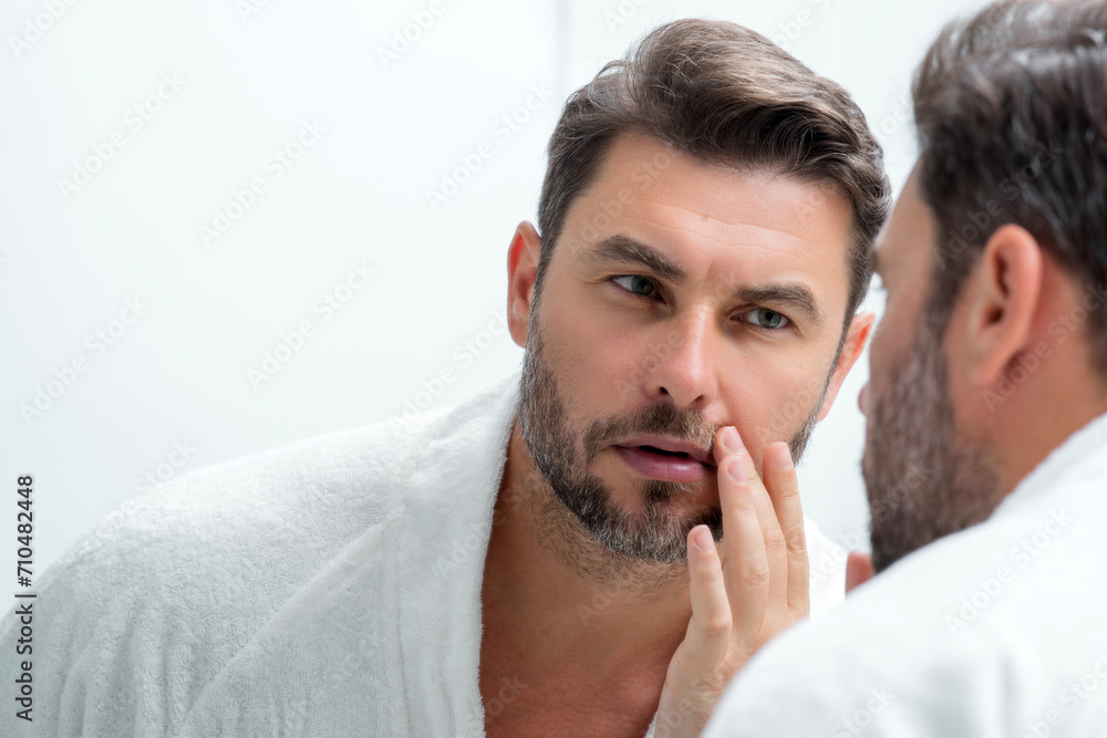 Cosmetic cream for man. Spa male model, skincare product for mens skin. Morning mask for skin with anti-aging effect. Skin care. Male face cream. Man with perfect soft skin. Beauty cosmetic product. Cosmetic cream for man. Spa male model, skincare product for mens skin. Morning mask for skin with anti-aging effect. Skin care. Male face cream. Man with perfect soft skin. Beauty cosmetic product.