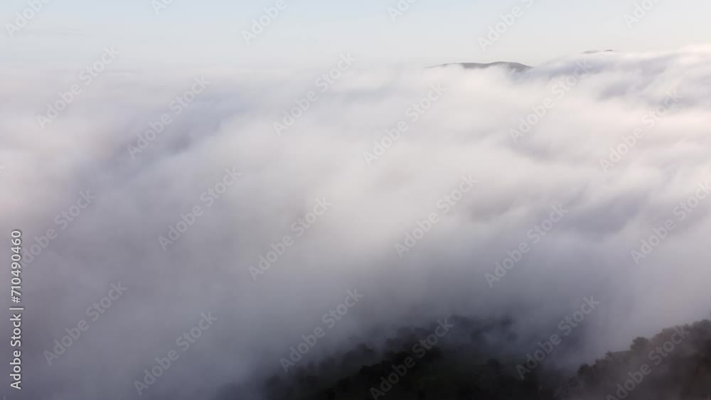 mesmerizing drone soars above a sea of clouds, revealing distant mountain peaks piercing through the mist. This awe-inspiring footage captures the ethereal beauty of floating mountains and cloudscape mesmerizing drone soars above a sea of clouds, revealing distant mountain peaks piercing through the mist. This awe-inspiring footage captures the ethereal beauty of floating mountains and cloudscape
