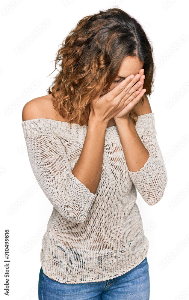 Beautiful young caucasian woman wearing casual clothes with sad expression covering face with hands while crying. depression concept. Beautiful young caucasian woman wearing casual clothes with sad expression covering face with hands while crying. depression concept.
