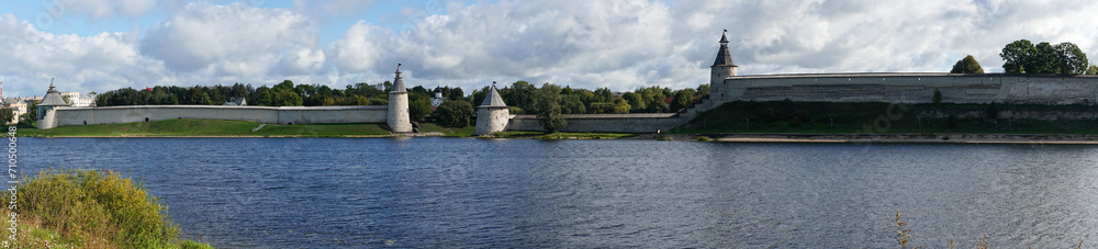 Pskov, Russia, September 6, 2023. Panorama of the walls of the old fortress in the city center. Pskov, Russia, September 6, 2023. Panorama of the walls of the old fortress in the city center.