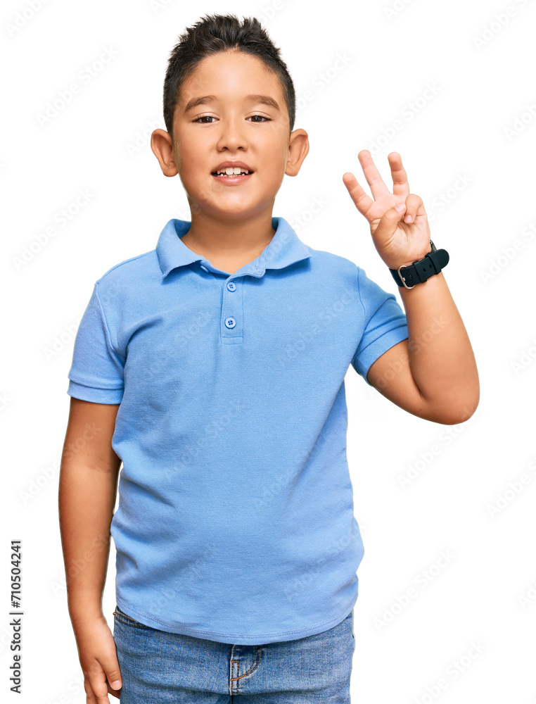 Little boy hispanic kid wearing casual clothes showing and pointing up with fingers number three while smiling confident and happy. Little boy hispanic kid wearing casual clothes showing and pointing up with fingers number three while smiling confident and happy.