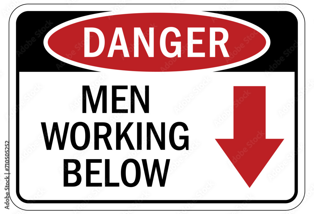 Men working below warning sign and labels Men working below warning sign and labels