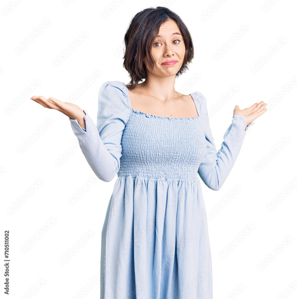 Young beautiful girl wearing casual clothes clueless and confused expression with arms and hands raised. doubt concept.
