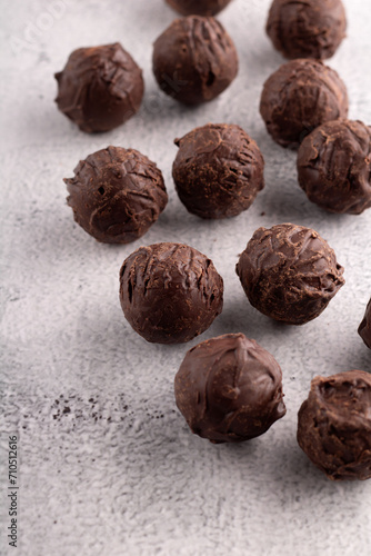 photo homemade chocolate truffle, a delectable confectionery i . This sweet treat promises a delightful burst of flavor against. A perfect indulgence for those with a penchant for homemade sweets.