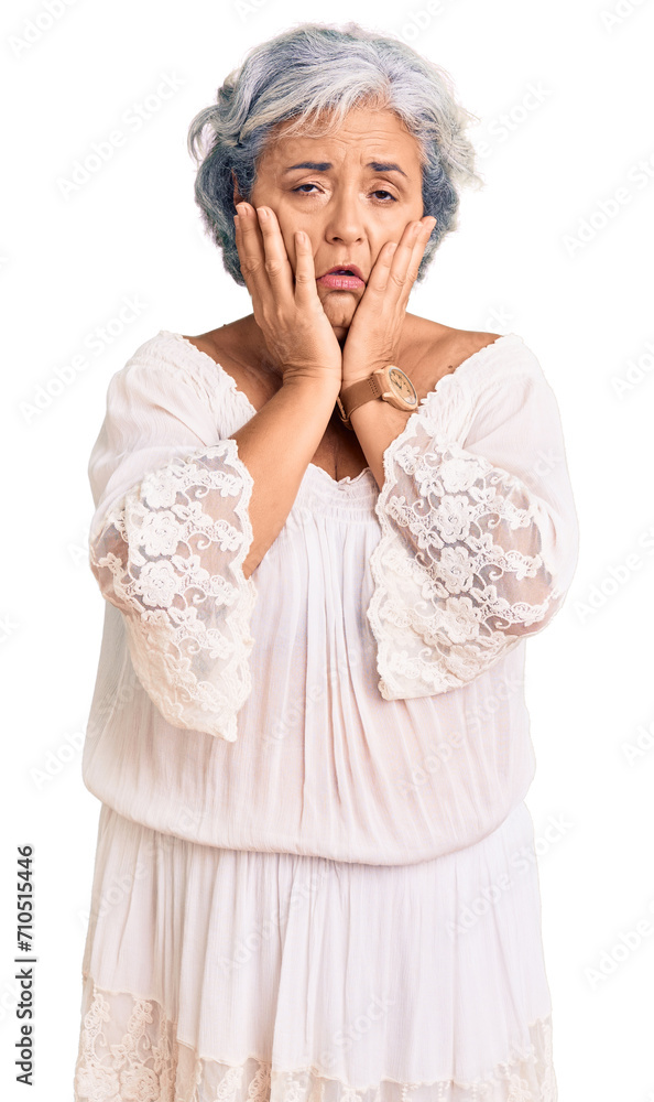 Senior woman with gray hair wearing bohemian style tired hands covering face, depression and sadness, upset and irritated for problem Senior woman with gray hair wearing bohemian style tired hands covering face, depression and sadness, upset and irritated for problem
