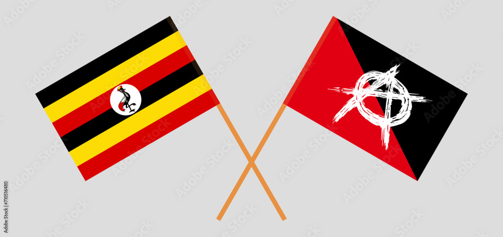 Crossed flags of Uganda and anarchy. Official colors. Correct proportion Crossed flags of Uganda and anarchy. Official colors. Correct proportion