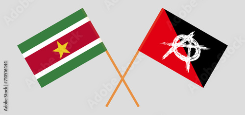 Crossed flags of Suriname and anarchy. Official colors. Correct proportion