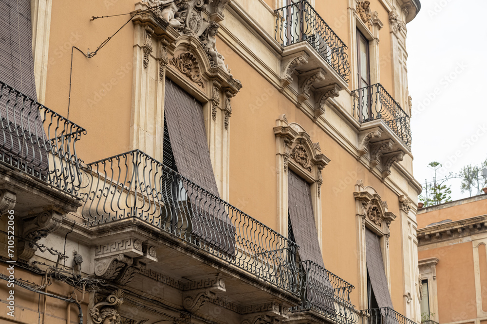 Facade of the house with balcony in Catania Sicily Italy.