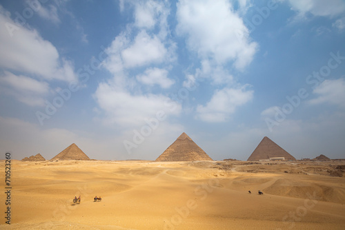 View of The Giza Necropolis, Famed archaeological site featuring the Great Pyramids, the Great Sphinx and The Great Pyramid of Giza in the desert of Giza, Cairo, Egypt. photo