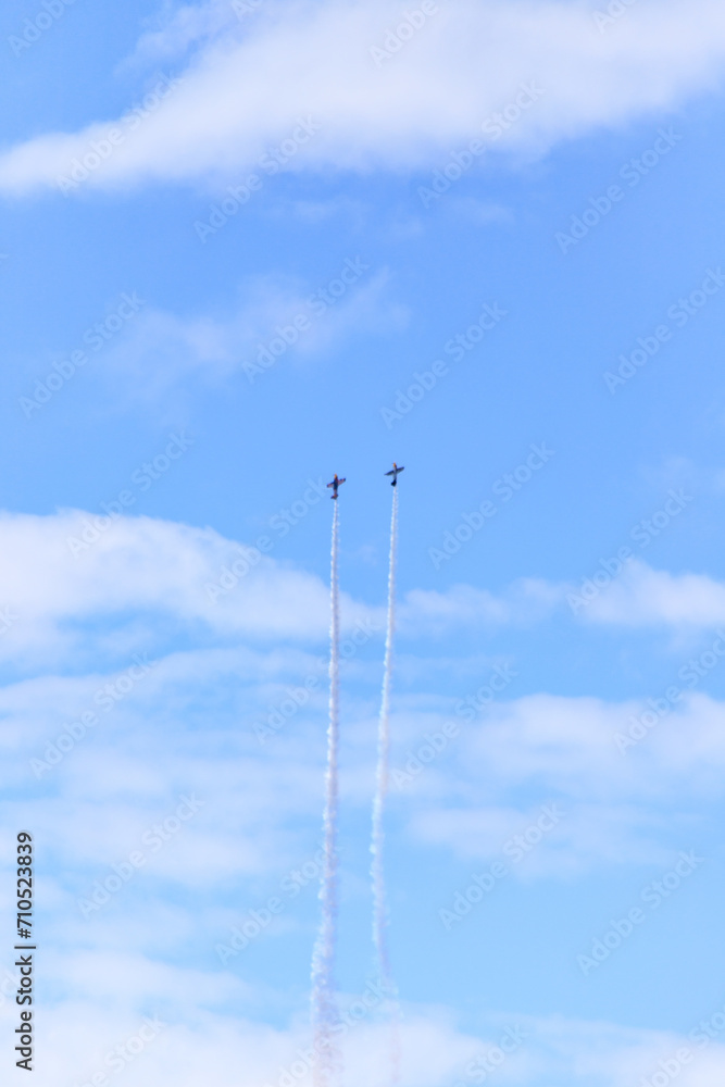 Aerobatic Duos: Skyward Spirals of Precision and Thrill Aerobatic Duos: Skyward Spirals of Precision and Thrill