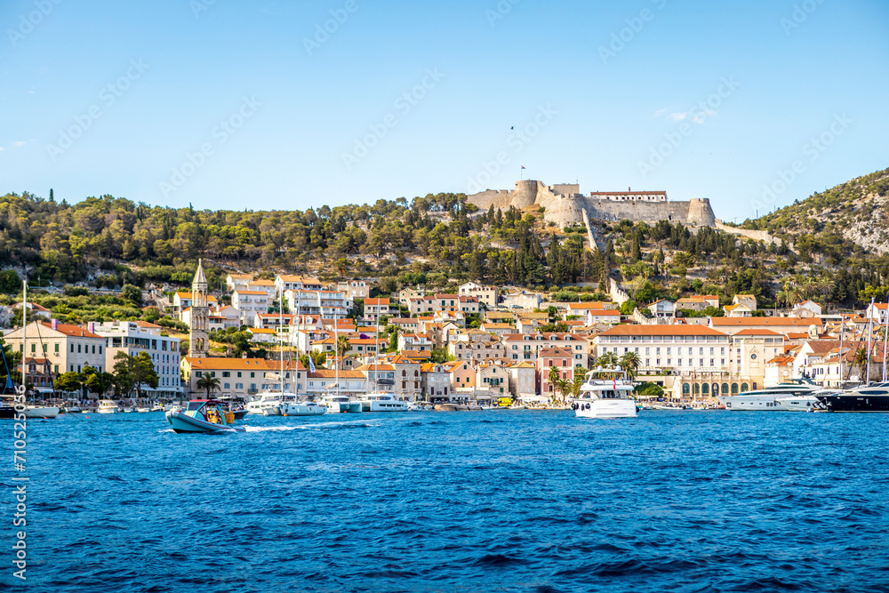 View of Hvar town and castle during summer in Croatia. View of Hvar town and castle during summer in Croatia.
