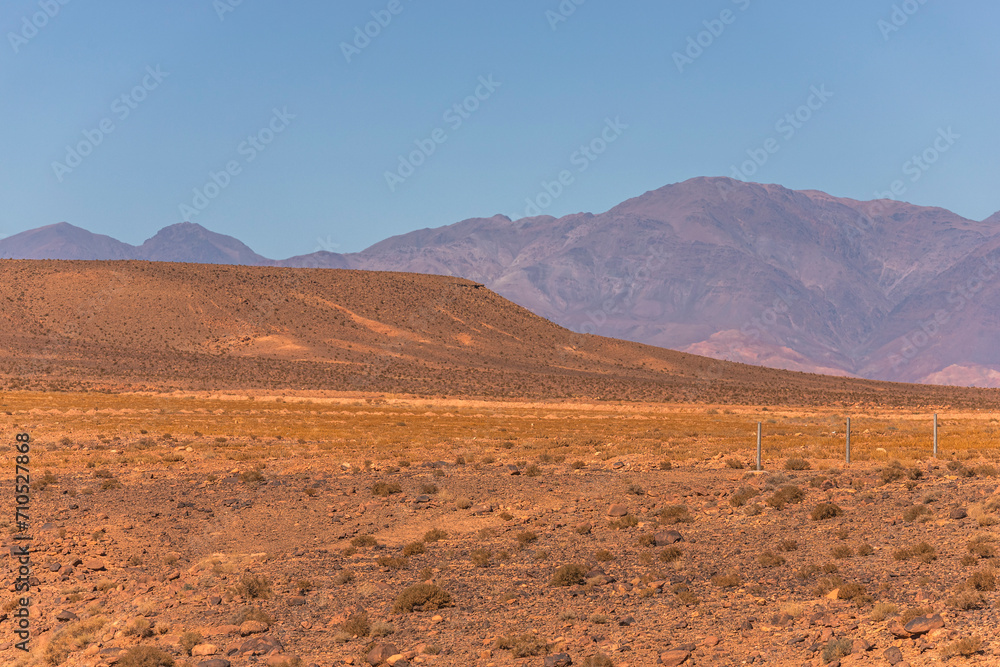 View of the valley across the mountains on the High Atlas mountain range, Ouarzazate, Morocco. View of the valley across the mountains on the High Atlas mountain range, Ouarzazate, Morocco.