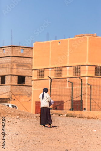 Wallpaper Mural Ouarzazate, Morocco - 18 November 2023: View of people in Berber village on the High Atlas mountains near Ouarzazate, Morocco. Torontodigital.ca