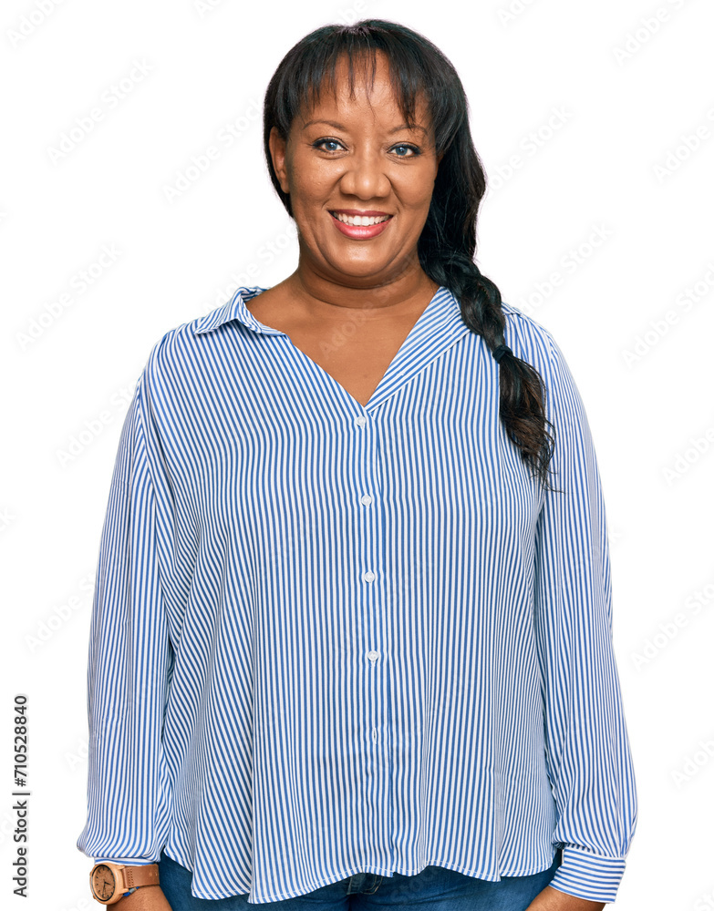 Hispanic middle age woman wearing casual clothes looking positive and happy standing and smiling with a confident smile showing teeth Hispanic middle age woman wearing casual clothes looking positive and happy standing and smiling with a confident smile showing teeth