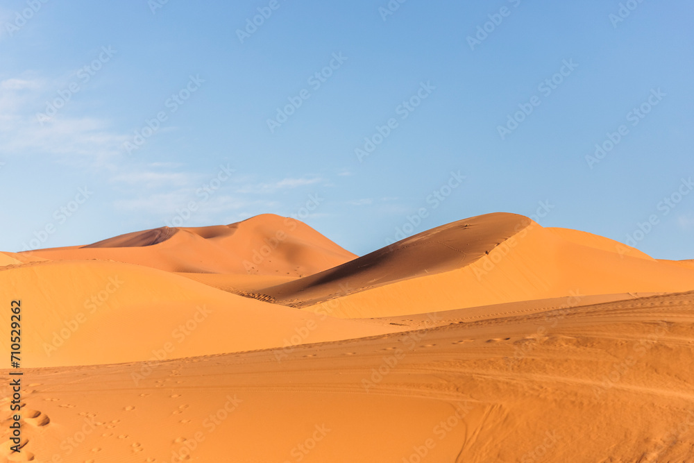 View of the Sahara desert sand dunes in Merzouga desert, Morocco. View of the Sahara desert sand dunes in Merzouga desert, Morocco.