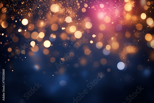 Shining golden and pink bokeh on the dark background