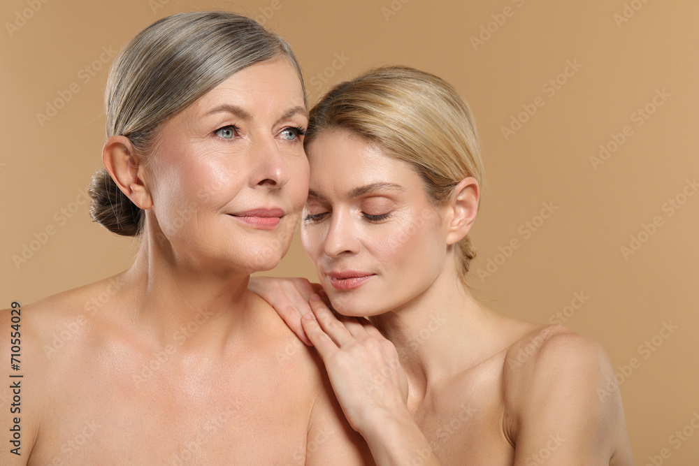 Beautiful women with healthy skin on beige background Beautiful women with healthy skin on beige background