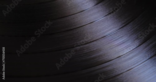 Vinyl record rotating in a macro shot photo