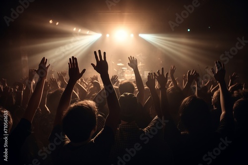 Energetic Concert Revelry: Dynamic Crowd of People Dancing, Vibrant Music Celebration.