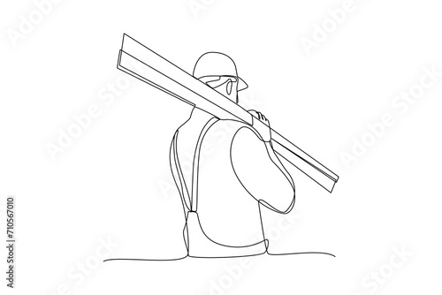 Continuous one line drawing a worker is lifting building equipment. Construction worker in uniform and helmet doing work. Builder concept. Repair work services. Single line draw design.