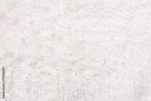 White faux fur fabric background texture. Full frame photo