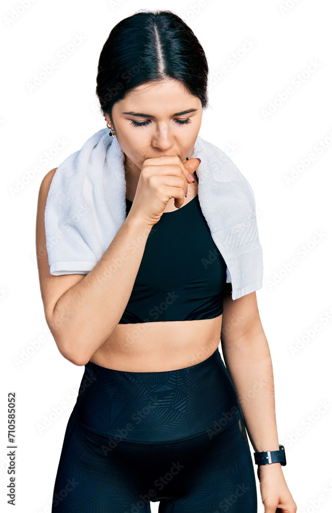 Young brunette woman with blue eyes wearing sportswear and towel feeling unwell and coughing as symptom for cold or bronchitis. health care concept. Young brunette woman with blue eyes wearing sportswear and towel feeling unwell and coughing as symptom for cold or bronchitis. health care concept.