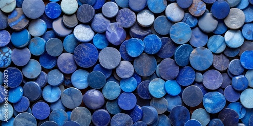 Assorted blue pebbles textured background - abstract stony surface photo