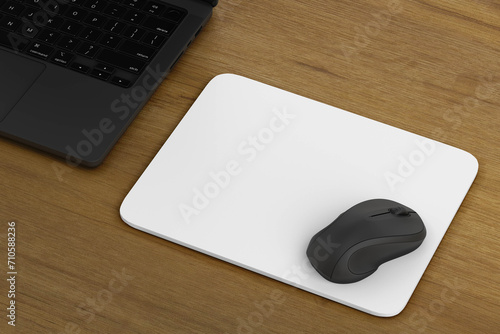 mouse pad on wooden table