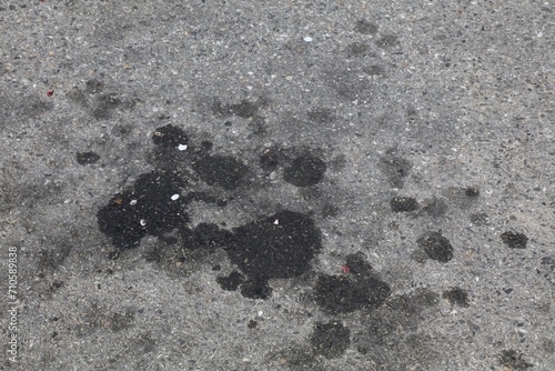 Car pollution - ground oil stain